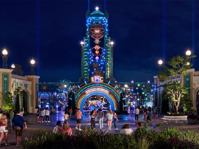Chronos tower in Celestial Park lit up at night